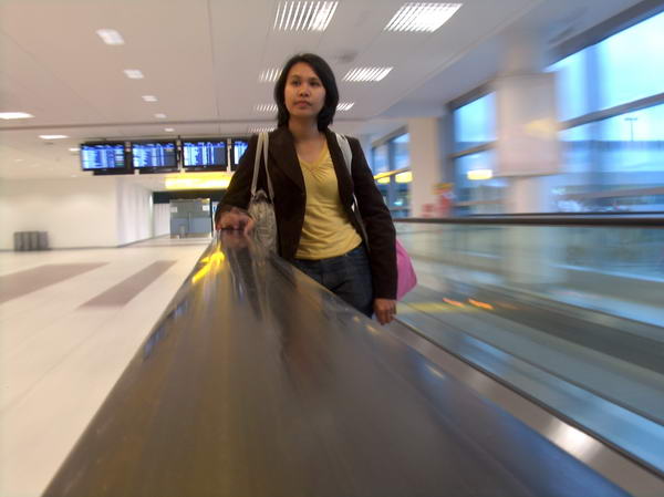 on walking stairs to the departure gate