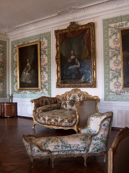 one of relaxing and meeting rooms with cozy couch