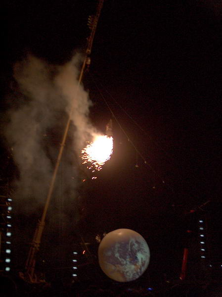 birdman flying over the globe