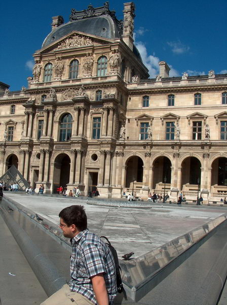 with louvre entrance at the background