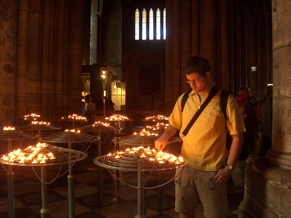 you can contribute by buying candles to lit up the church