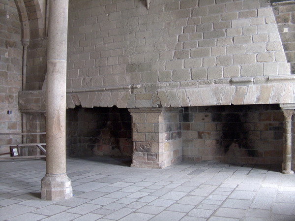 Gigantic fireplace - can you imagine th fire to heat such a big room?