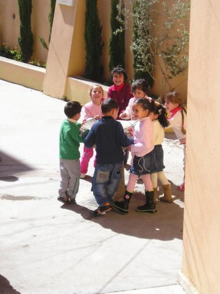 Arabské křesťanské děti na dvoře své školy během přestávky/Christian Arab children on the yard of their school during a break