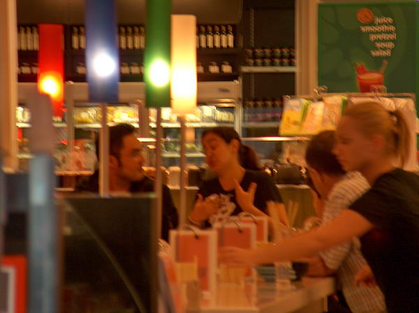 I know this is bad photo. But you've got to believe us: that guy in the back is a famous Indonesian pop star!!! And he ate in the same sushi train with us!!!;-)