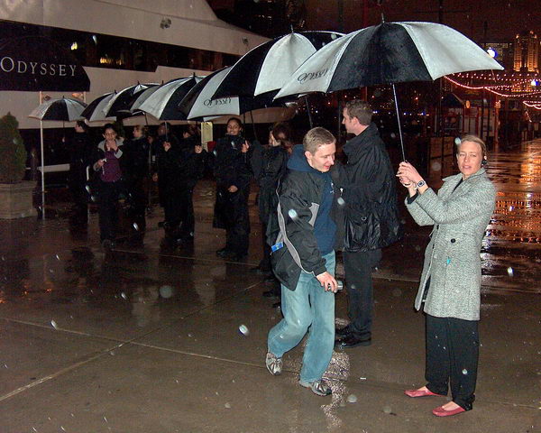 Leaving the boat under umbrella passage made by the crew