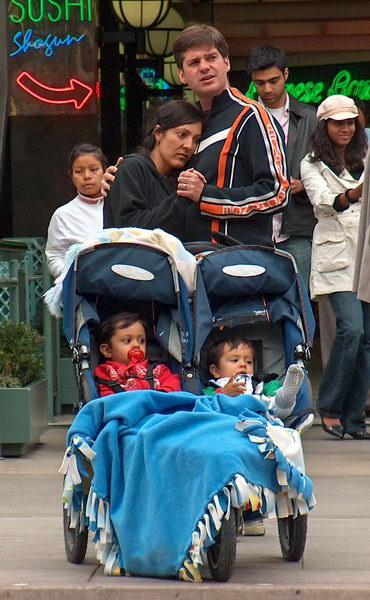 Couple with twins stopped to listen too