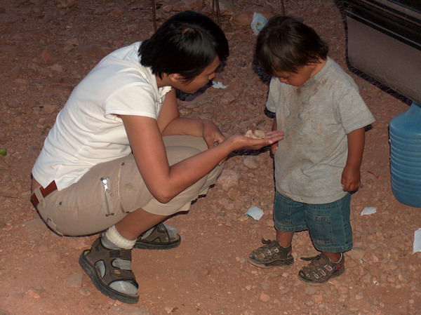 Imelda trying to trade with another little Navajo