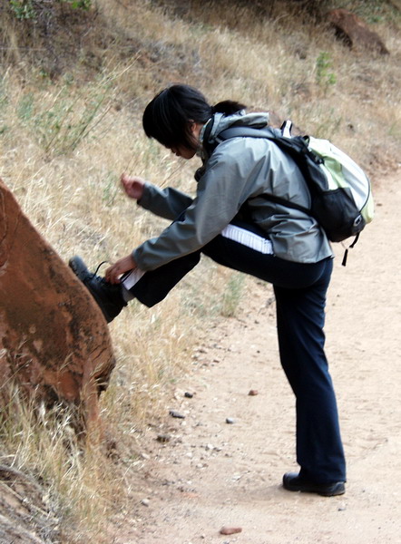 Shoko tightens her shoe lace and there we go