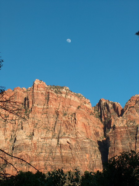 Sun is setting, moon is rising