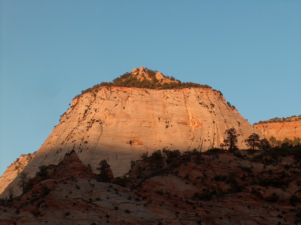 Valley is in shade already but the hils still warmly lit