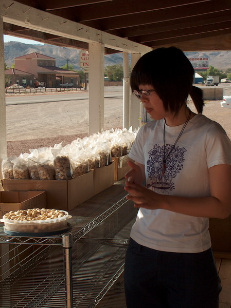 Shoko contemplating about peanuts